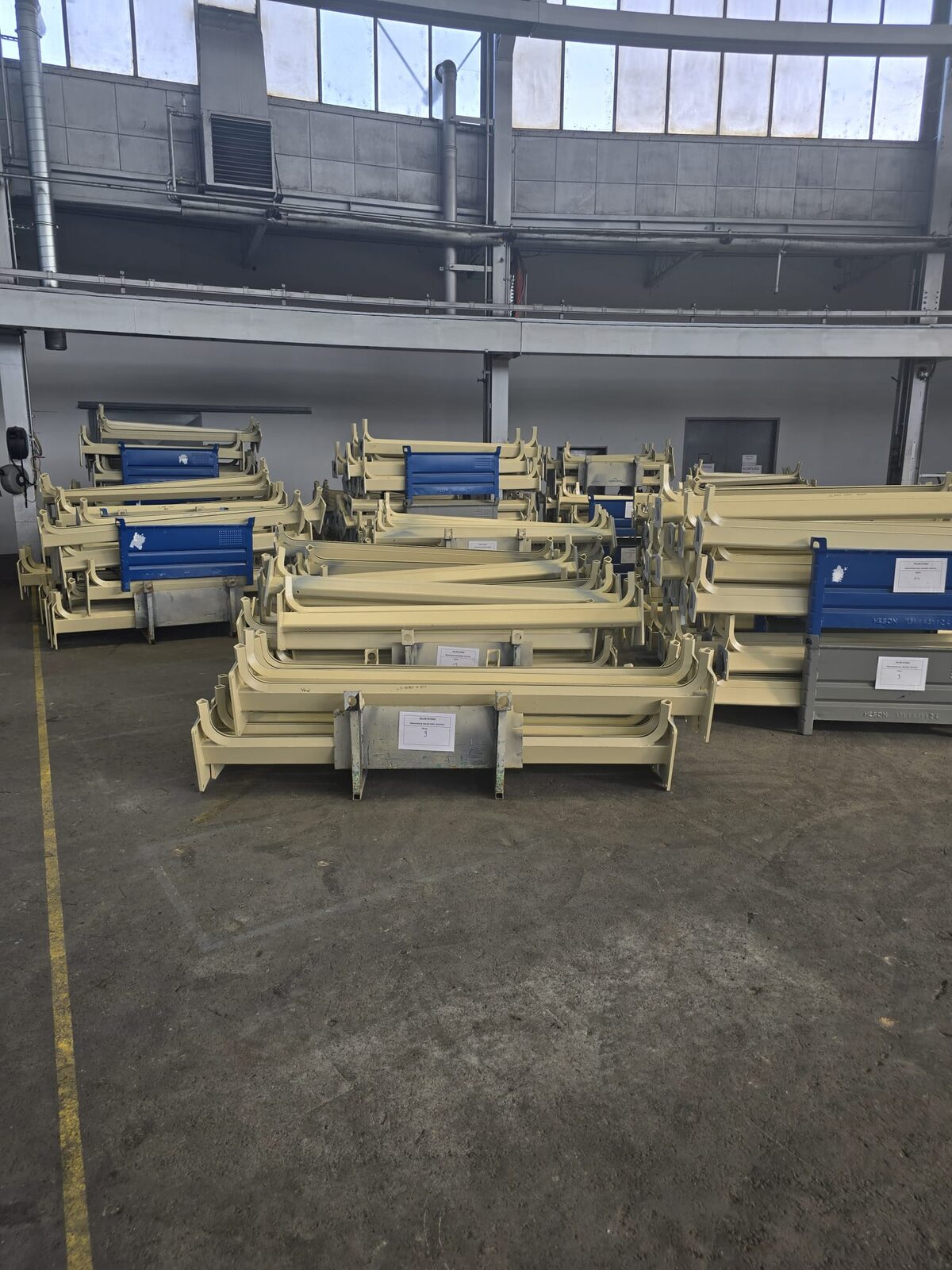 Machine components staged for assembly at the Binder+Co factory